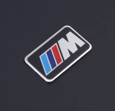 Emblematy samochodowe ze stali nierdzewnej
